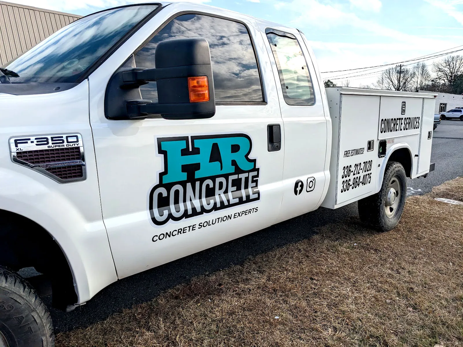A white Ford F-350 utility truck with a large teal and black HR Concrete logo on the door and service lettering on the bed.